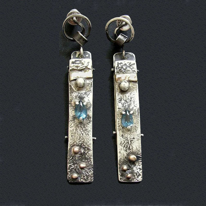 Boucles d'oreilles artisanales en pierre bleue