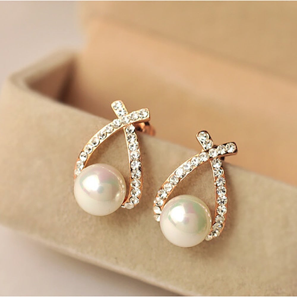 Boucles d'oreilles ornées de perles et de paillettes