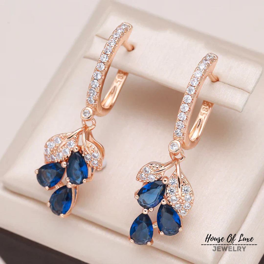 BOUCLES D'OREILLES EN ROSE GOLD AVEC PÉTAL DE SAPHIR