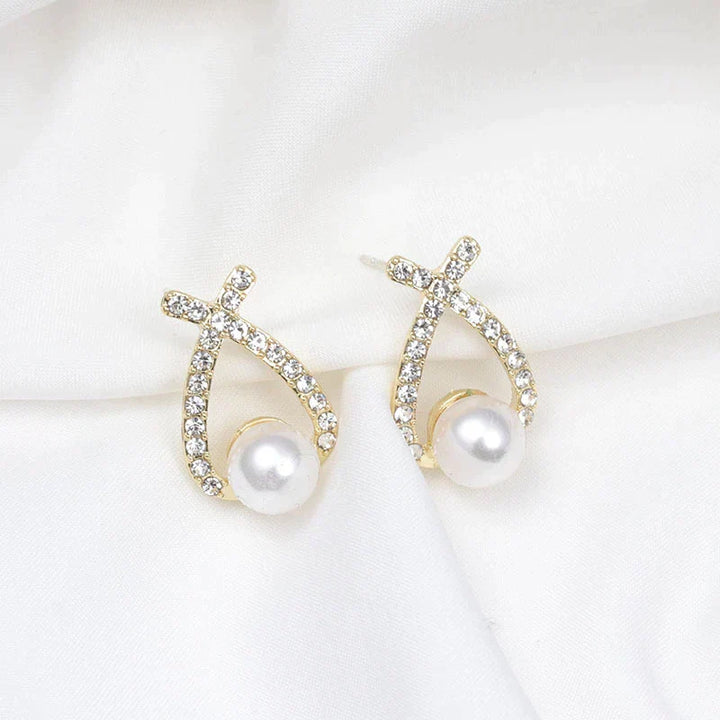 Boucles d'oreilles ornées de perles et de paillettes