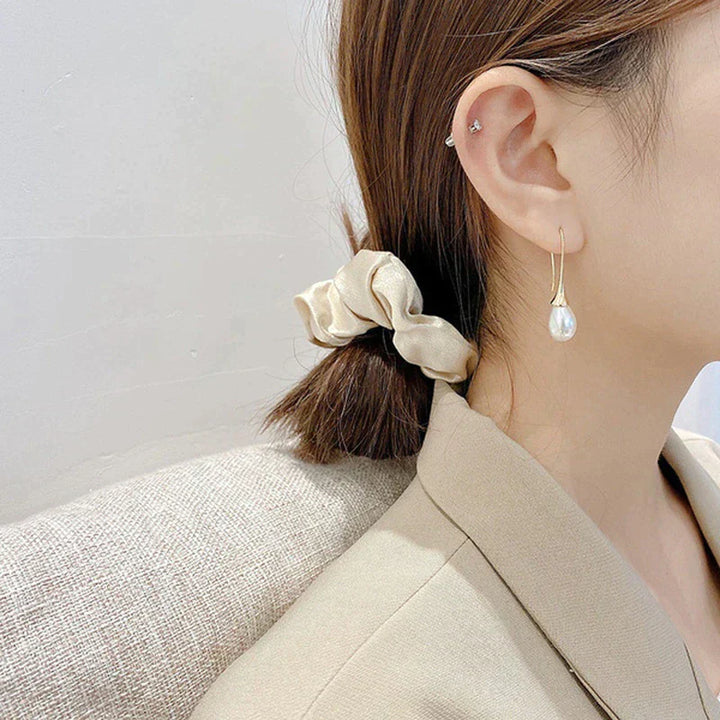 Pendantes boucles d'oreilles ornées de perles