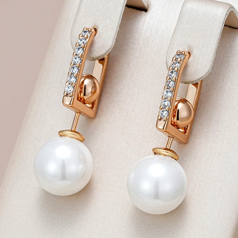 Élégantes boucles d'oreilles ornées de perles scintillantes